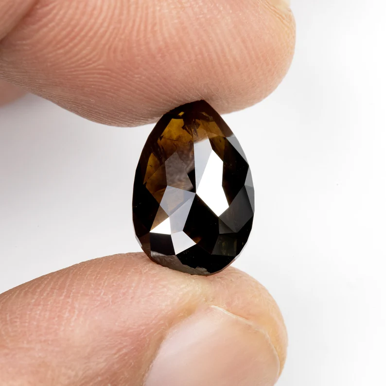 4.45ct. Untreated Natural Dark Brown Diamond both sides faceted Pear Shape Solitaire